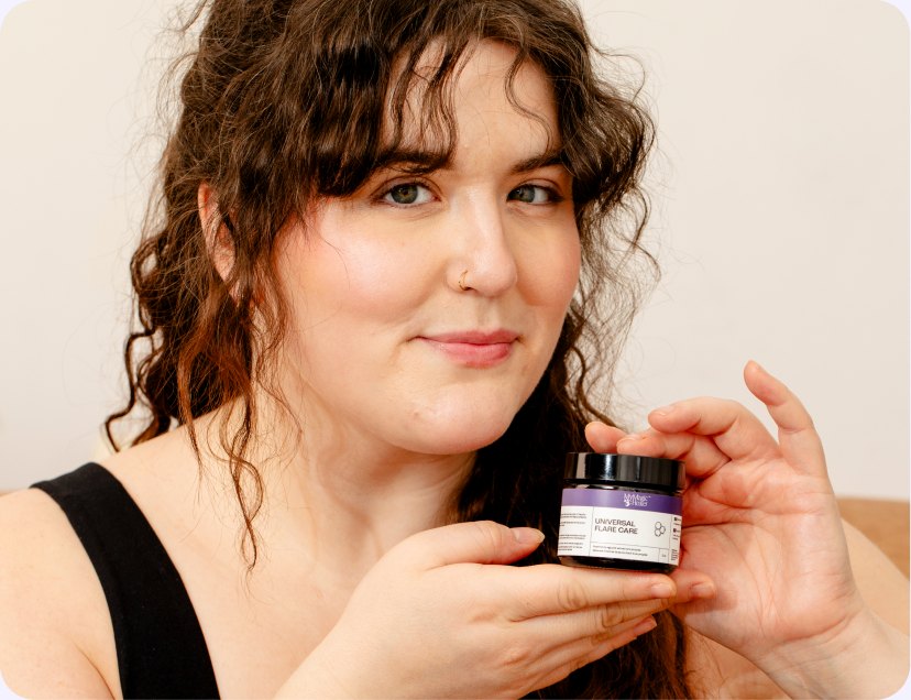 Woman holding MyMagicHealer Flare Care